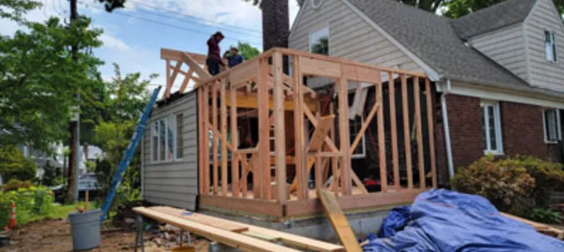 Rear extension framed in lumber on the back of a home